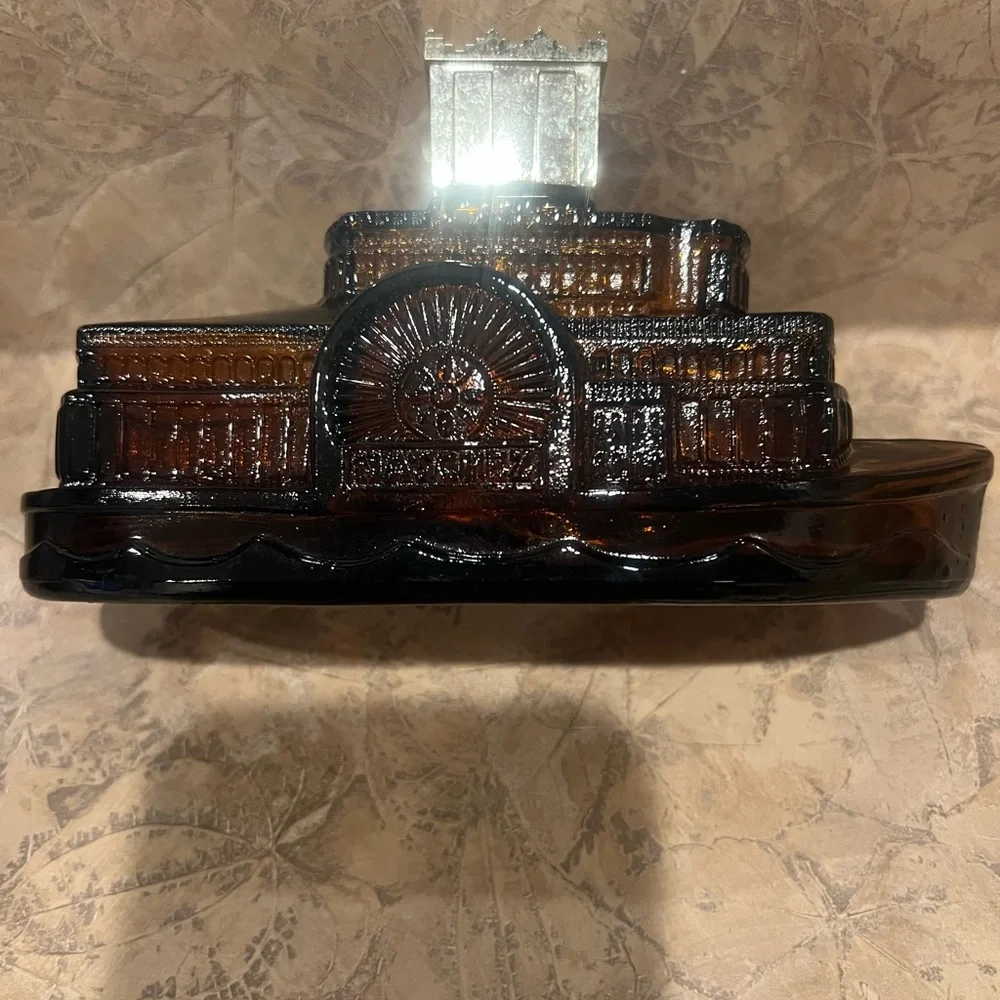 Vintage Avon 70’s steamboat decanter..‎